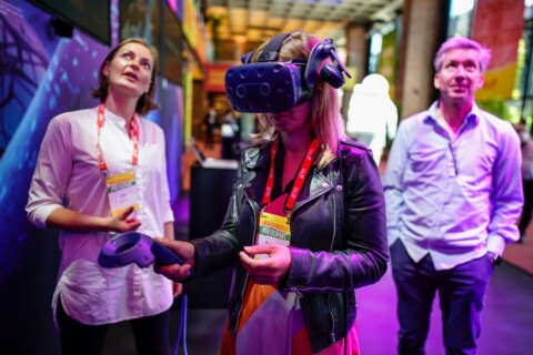 DLD Munich 2022, participant testing VR goggles