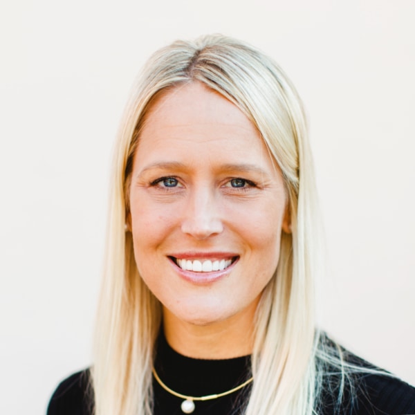 Headshot portrait image of Jennifer Jacobs Dungs, Global Head of Mobility at EIT InnoEnergy, in front of a neutral white background, smiling at the camera.