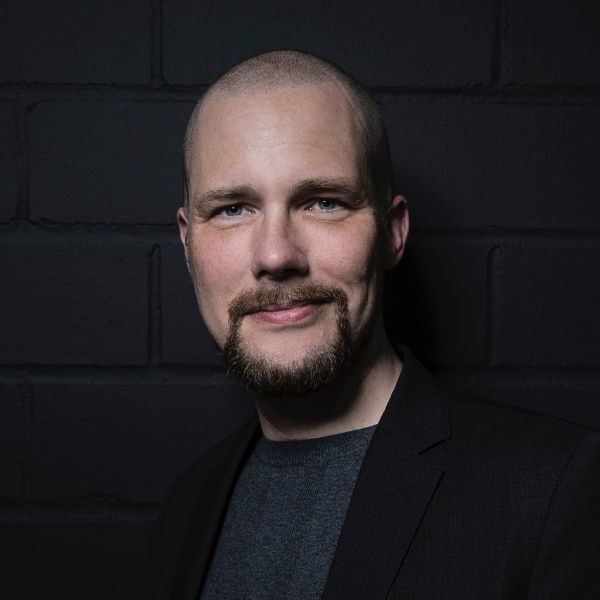 Portrait image of Jonas Andrulis, Founder and CEO of AI company Aleph Alpha