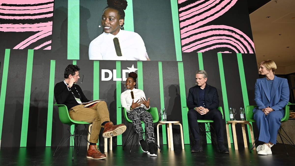 Greg Williams (WIRED UK), Priscilla Chomba-Kinywa (Greenpeace International), Peter Koerte (Siemens) and Christina Raab (Accenture) on stage at DLD Munich Conference 2023