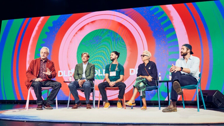Panelists on stage at DLD Circular 2023 discussing the value of regenerative agriculture. From left to right: Moderator David Kirkpatrick, Jan-Gisbert Schultze (Acton Capital Partners), Fabio Volkmann (Climate Farmers), Doris Doerrie (Film Director, Producer & Author), Benedikt Boesel (Gut & Boesel)