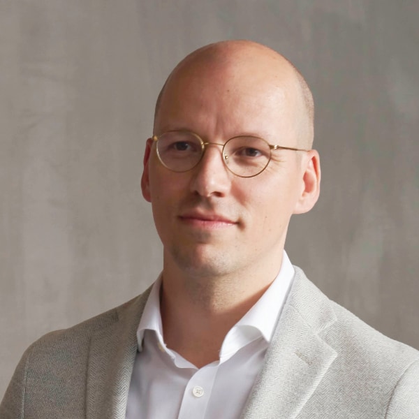 Portrait image of Gundbert Scherf, Co-Founder & Co-CEO of Helsing AI