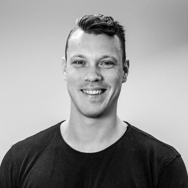 Black and white portrait photo of Victor Riparbelli, CEO & Co-Founder of AI media company Synthesia