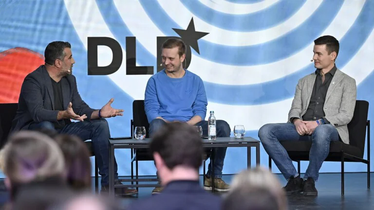 Bulent Altan (Alpine Space Ventures), Nils Bernhardt (The Exploration Company) and Raycho Raychev (EnduroSat) on stage at the DLD Munich Conference 2024.