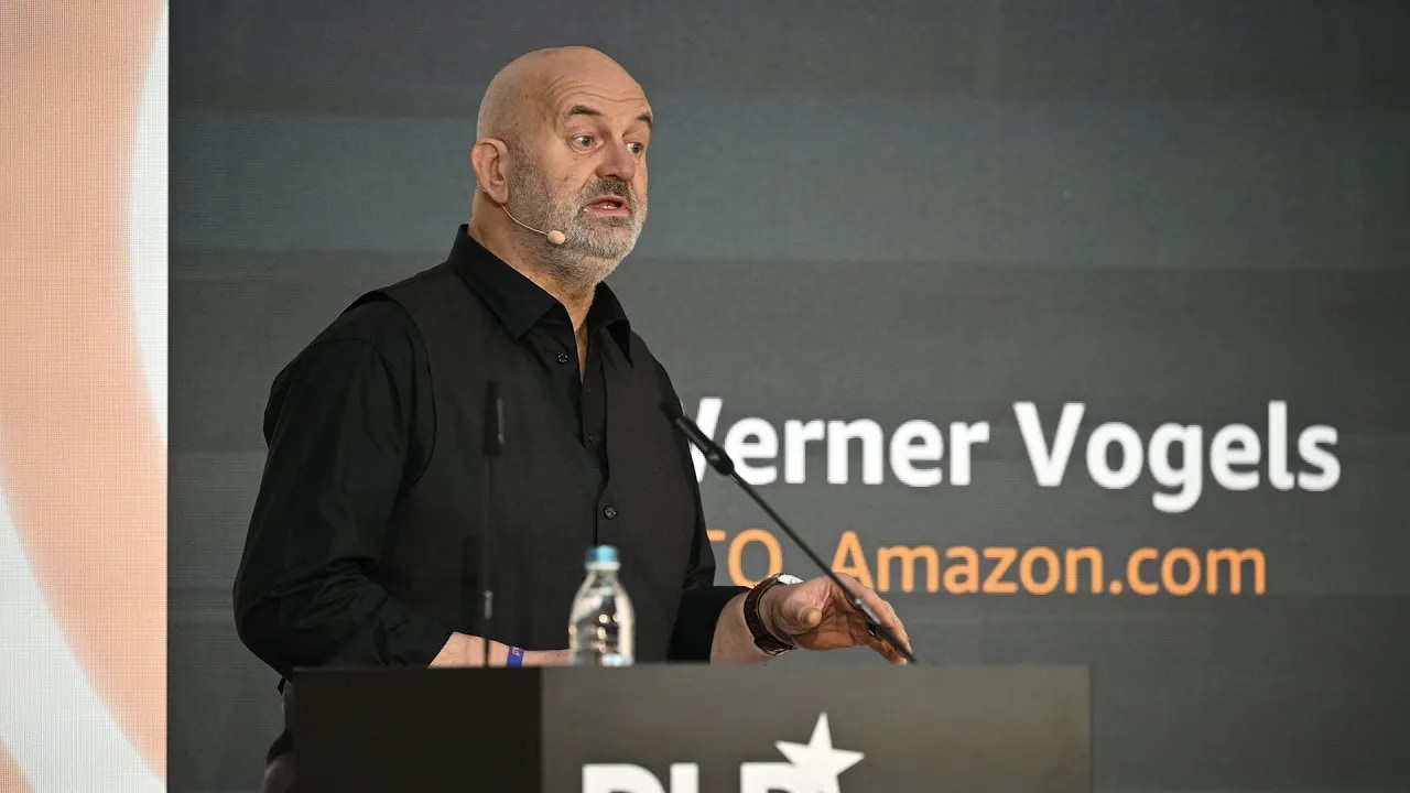 Amazon CTO Werner Vogels, wearing a black shirt, speaks at the DLD Munich 2024 conference about AI for good.