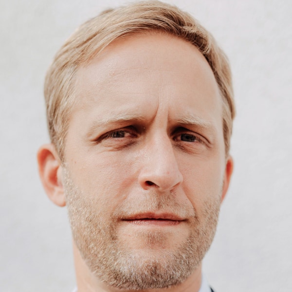 Close-up portrait of AI and digital health researcher Björn Eskofier of Friedrich-Alexander University, Erlangen-Nürnberg