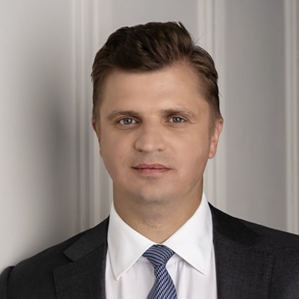 Portrait image of Lithuanian politician and military expert Giedrimas Jeglinskas, wearing a suit and tie, looking at the camera.