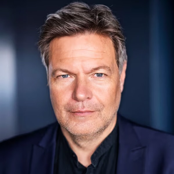 Studio portrait of German politician Robert Habeck (Green party), looking straight at the camera.