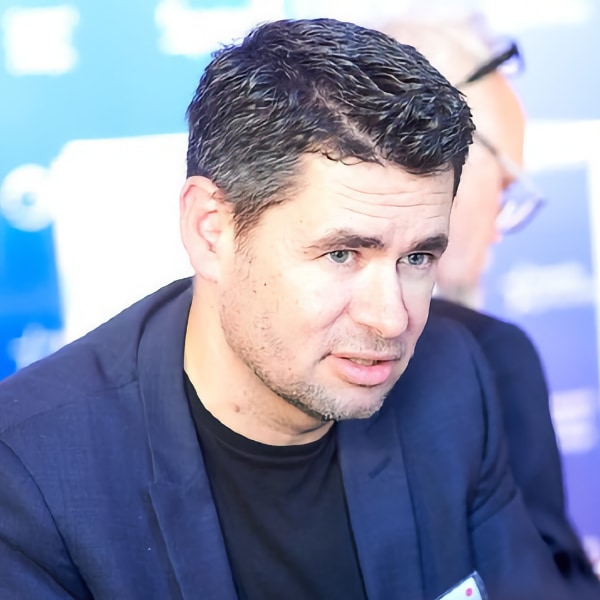 André Loesekrug-Pietri, JEDI program, speaking to other people at an event.