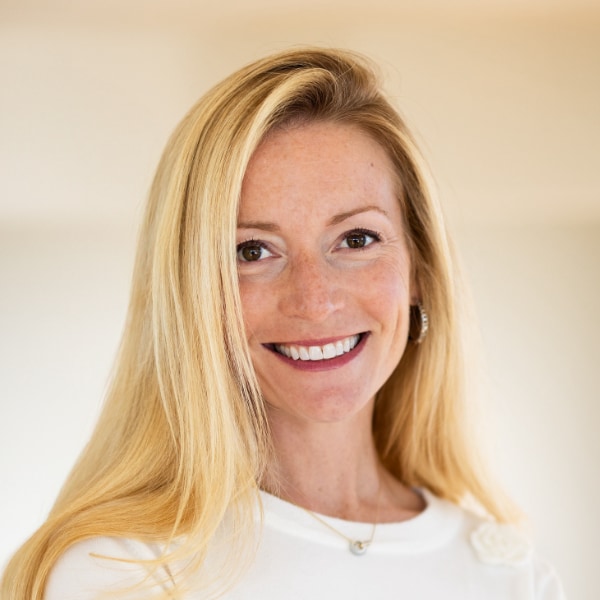 Studio portrait of Genevieve Jurvetson (Psychedelic Science Funders Collaborative, The Jurvetson Foundation), smiling at the camera.