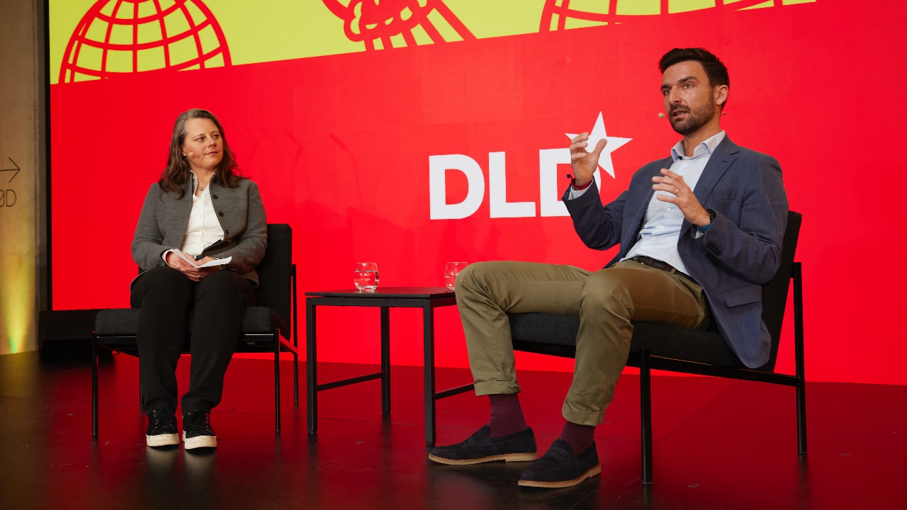 Inga Grieger, (BMW i Ventures), left, and Andreas Kyrtatos, (Embotech) discuss the future of automated decision making at the DLD Munich Conference 2025.