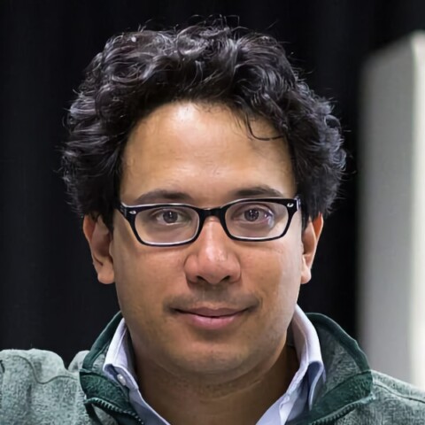 Headshot portrait of AI researcher Aldo Faisal.