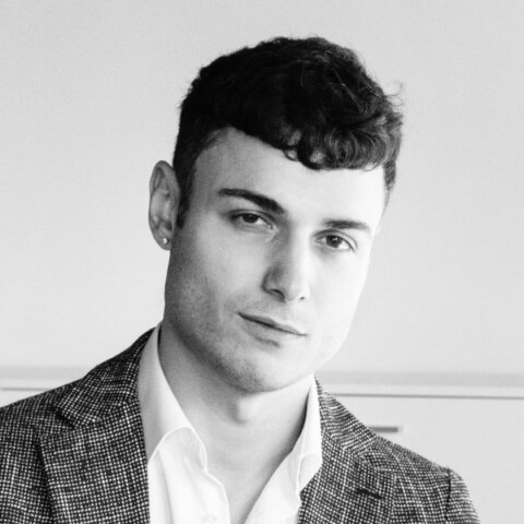 Black-and-white portrait of Giovanni Pizza, co-founder of BonusX