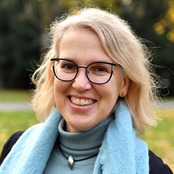 Headshot portrait of German AI ethics professor Kerstin Schlögl-Flierl, University of Augsburg, in an outdoor setting.