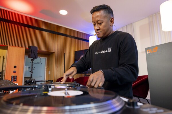 Angelog Tun, known as DJ Angelo, spinning records at the DLD Future Hub conference.