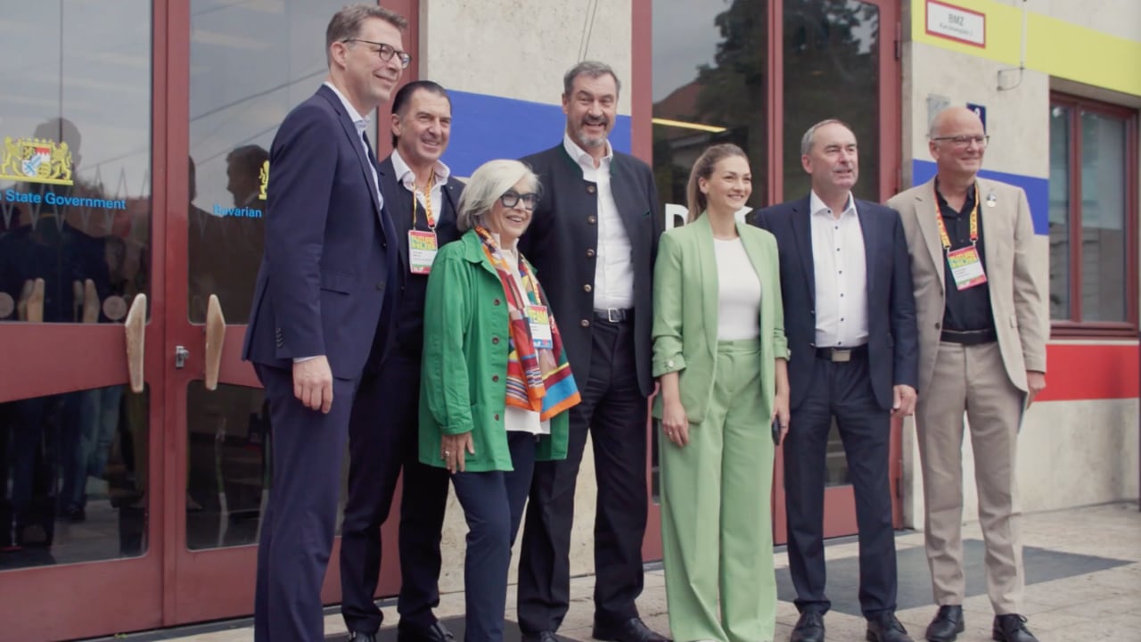 Bavarian politicians posing for a photo with DLD conference founder Steffi Czerny at the DLD Future Hub conference in Munich.