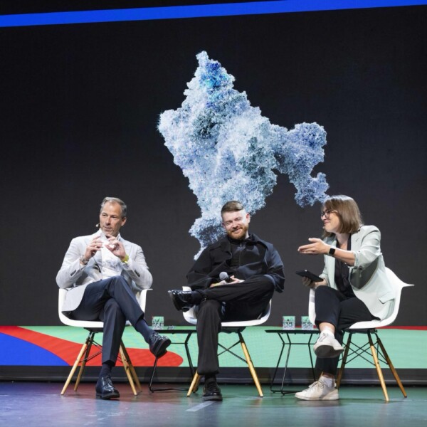 Anders Warming (BMW Group), Harry Yeff (Reeps100 Studio) and Larissa Holzki (Handelsblatt) discuss AI and design at the DLD Future Hub conference in Munich.