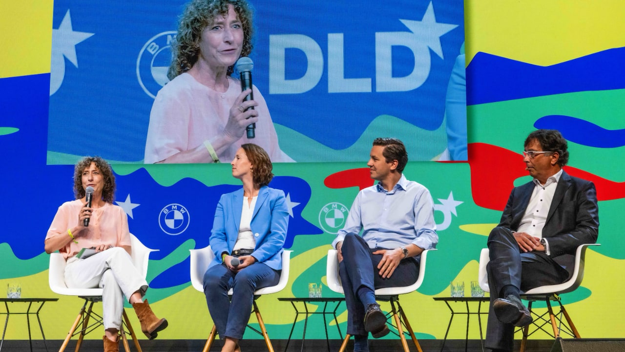 Panelists Niko Mohr (Friedhelm Loh Group), Christina Reuter (TUM) Felix Heinricy, (Resourcify), Susanne Kadner (CIRCULAR REPUBLIC) on stage at the DLD Future Hub conference in Munich.