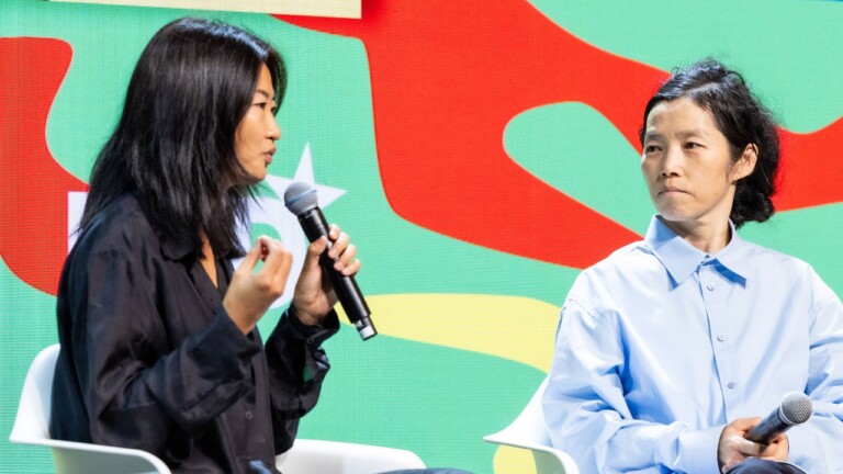 Xue Tan, (Haus der Kunst & Shanghai Biennale), left, speaks with artist KOO JEONG A at the DLD Future Hub conference in Munich.