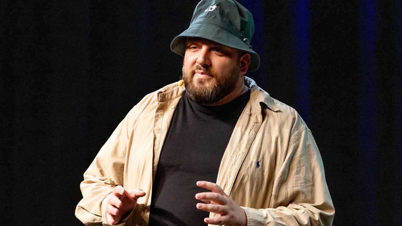 Albanian entrepreneur Gerhard Veizi (Vytal) on stage at the DLD Future Hub conference in Munich.