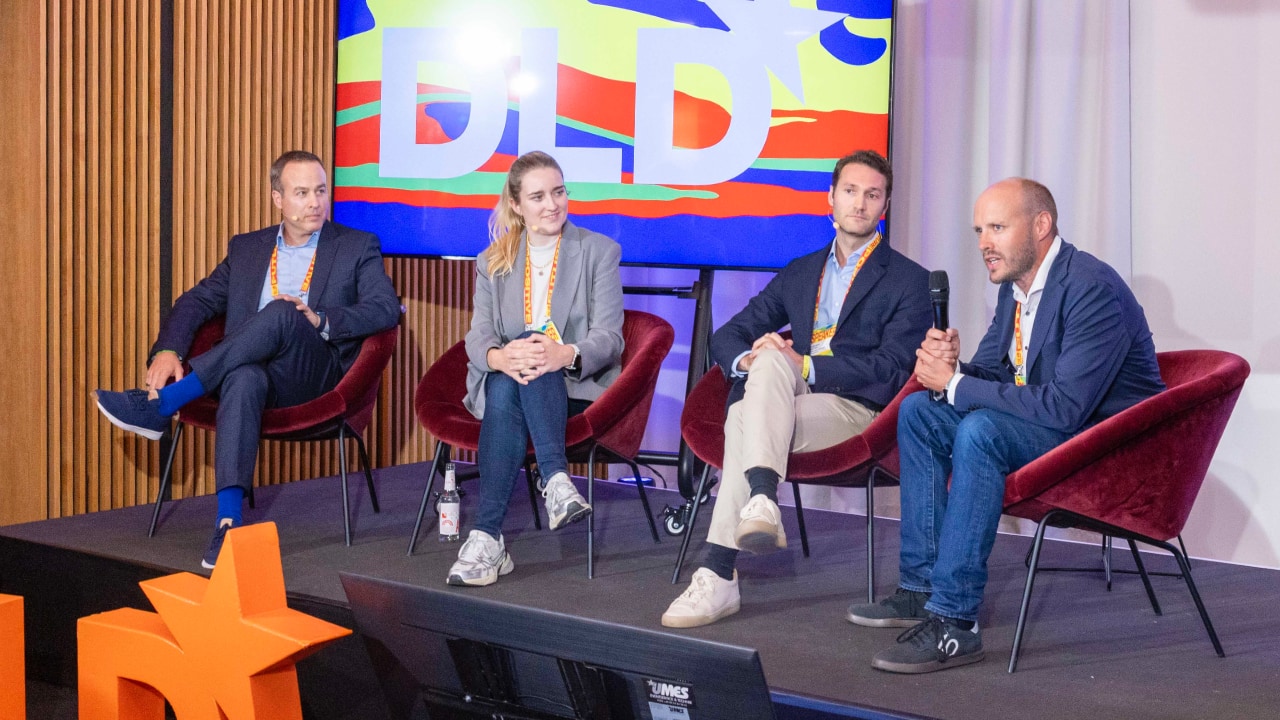 Christian Adler (LoopID), Eva Spannagl (OpenAI), Fabien Rozzi (Make) and Thomas Zeller (UnternehmerTUM) on stage at the DLD Future Hub conference in Munich.