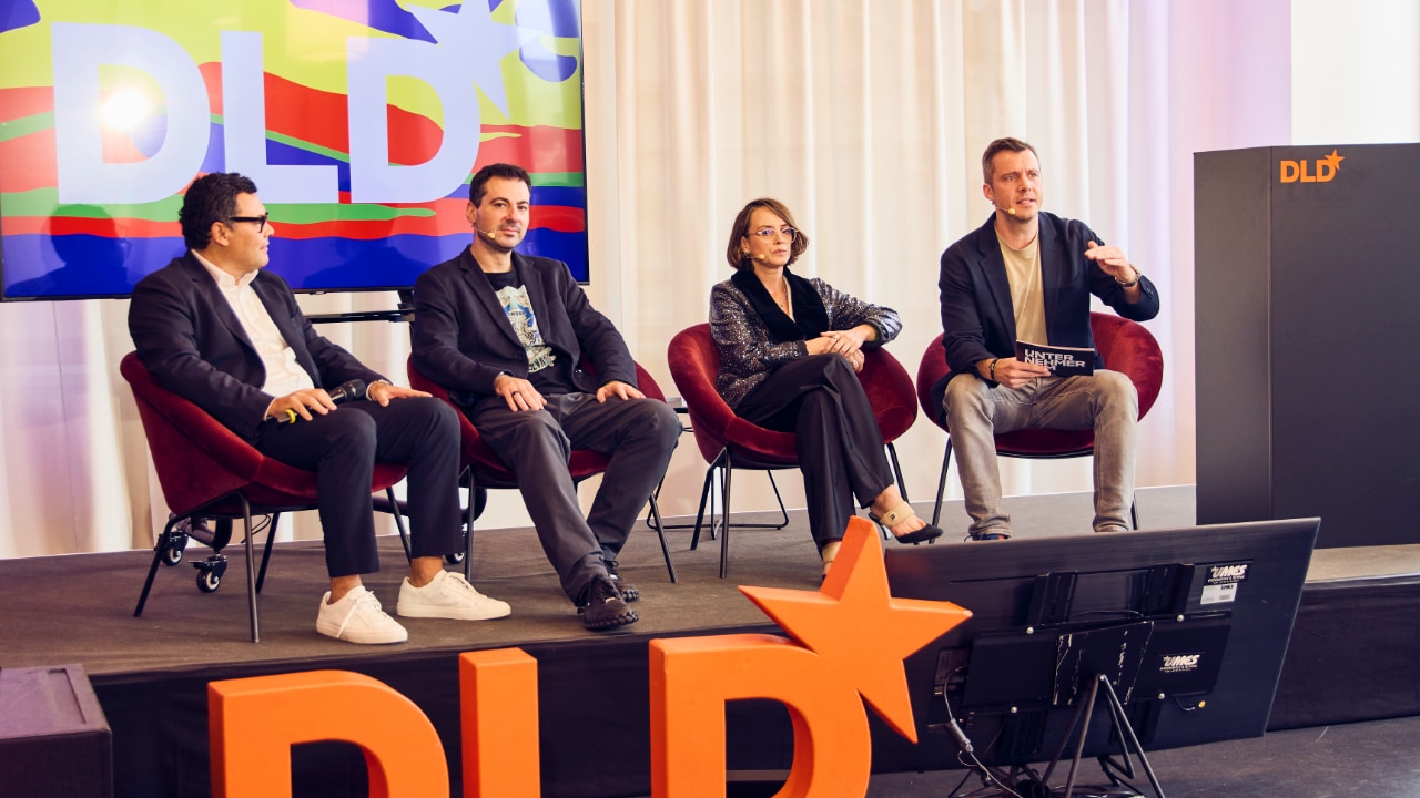 Vlad Ciurca (Techsylvania), Helga Mustafaraj (Innovation Hub), Stefan Druessler (UnternehmerTUM), Krloos Rivera (Startup Valencia & Valencia Innovation Capital) on stage at the DLD Future Hub conference in Munich.