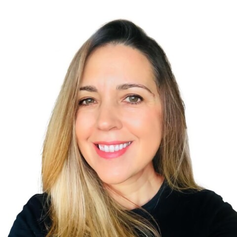 Selfie-style headshot of Marta Mucznik, analyst at the International Crisis Group, in front of a white background.