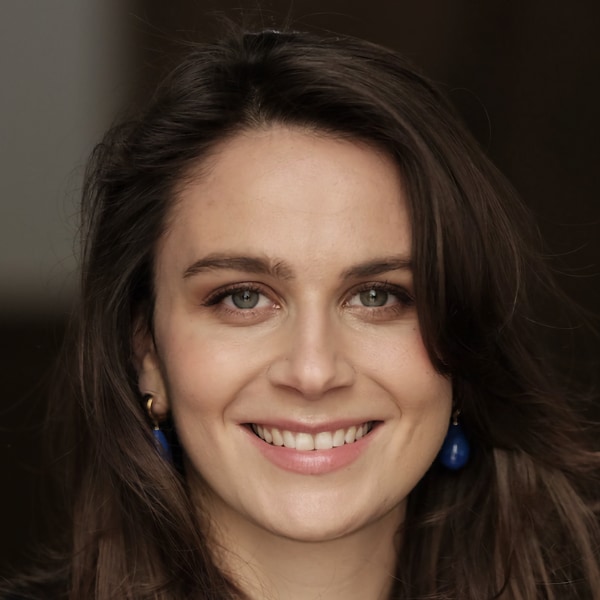 Headshot portrait of Empion co-founder Annika von Mutius in front of a dark background.