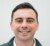 Headshot portrait of Differential Bio CEO, co-founder Christian Spier, in front of a neutral, light grey background.