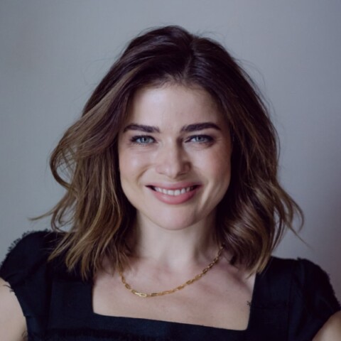 Portrait of venture investor Evgenia Plotnikova, Dawn Capital, in front of a grey studio background