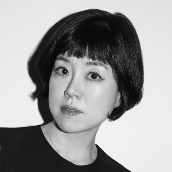 Black-and-white portrait of author and consultant Fiona Bae.