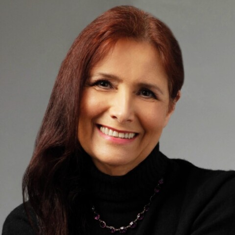 Headshot portrait of Kay Firth-Butterfield, CEO of Good Tech Advisory, in front of a grey studio background.