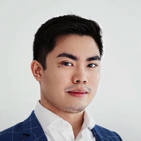 Portrait of Kasagi Labo founder Kendrick Wong in front of a light grey studio background.