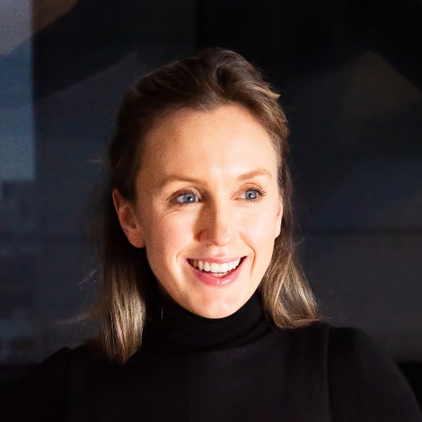 Headshot portrait of investor Lina Wenner, firstminute capital, brightly lit in front of a dark background.