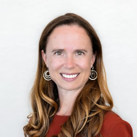 Portrait of Deep Fission CEO Liz Muller in front of a white background.