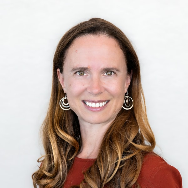 Portrait of Deep Fission CEO Liz Muller in front of a white background.