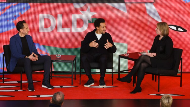 Left to right: Alessandro Centrone (Steelcase), Oliver Heilmer (BMW Group) and Amy Wilkinson (Ingenuity) on stage at the DLD Munich 2026 conference.