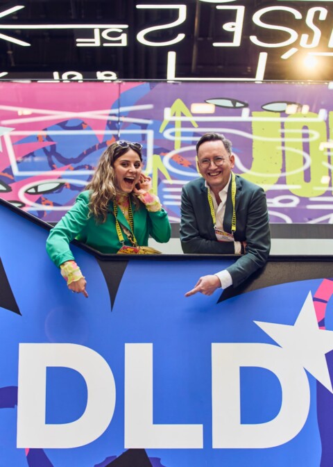 DLD Munich 2026 attendees smiling at the camera