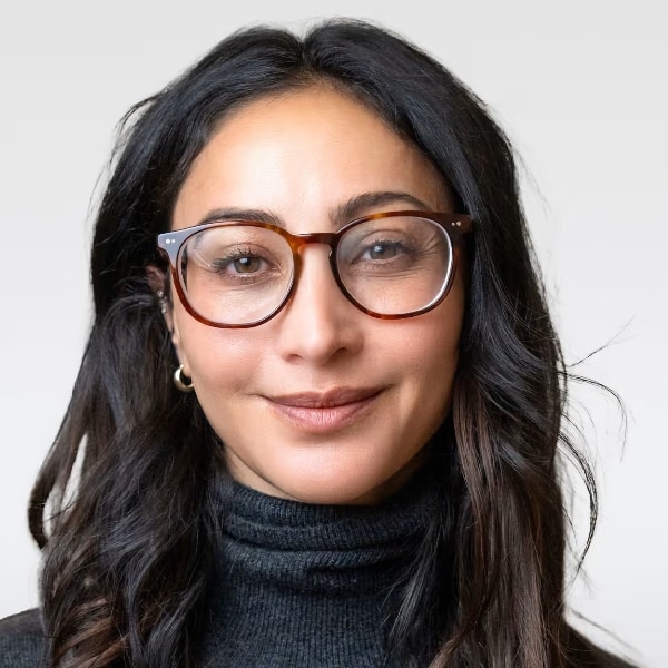 Headshot portrait of Dr. Doreen Zarfati, Chief Medical Officer of Fountain Health, in front of a grey studio background