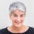 Portrait of health expert Julia Schnabel, TUM, Helmholtz Munich, in front of a neutral grey background