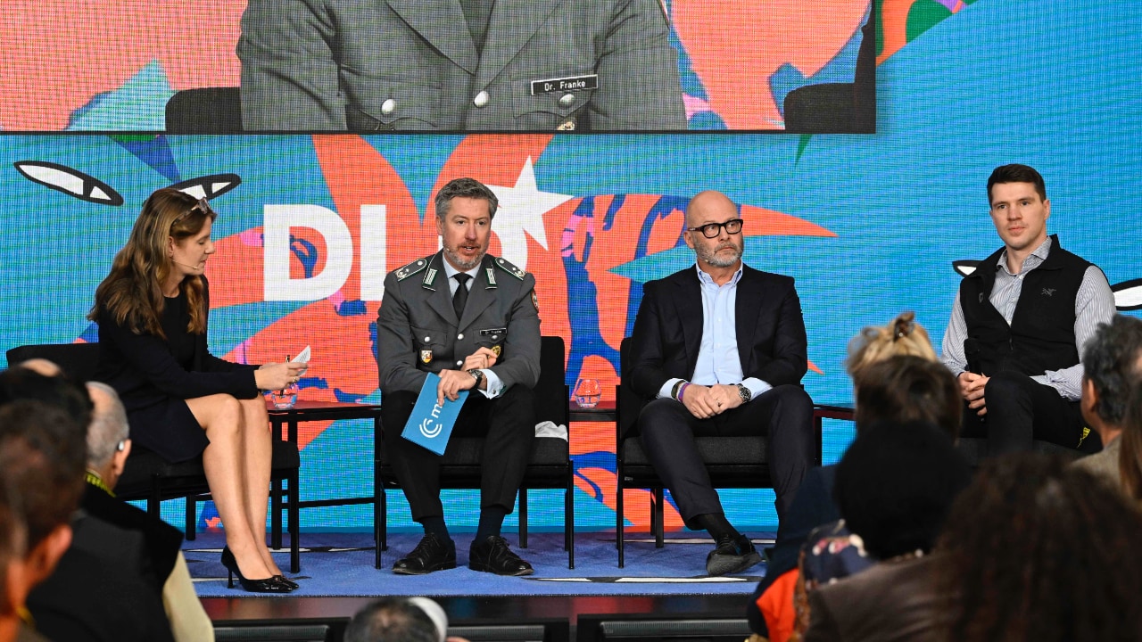 Video preview of Tanit Koch (FOCUS), Benedikt Franke (Munich Security Conference), Marco Iannaccone (HypoVereinsbank/UniCredit) and Bal&aacute;zs Nagy (TYTAN Technologies) speaking at the DLD Munich Conference 2026. Photo: Sebastian Gabriel / picture alliance for DLD / Hubert Burda Media