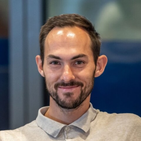Headshot portrait of sports analytics expert Patrick May, co-founder of Board11