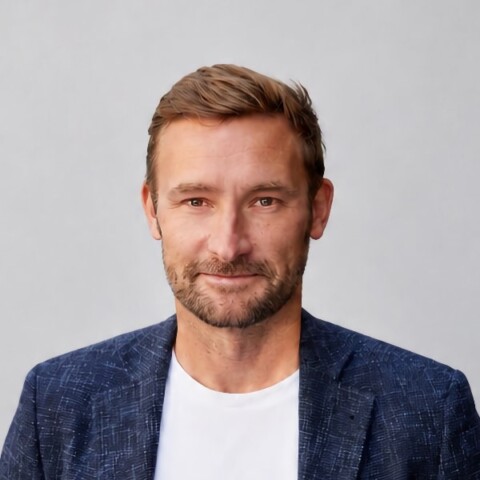 Studio headshot portrait of Christian Volk, FIFA Director of Gaming and Esports