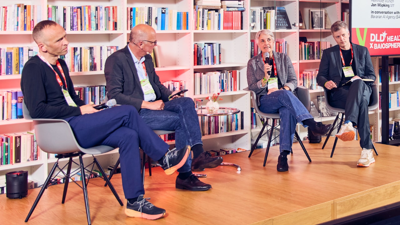 Carsten Marr (Helmholtz Munich/LMU), Julia Schnabel (Technical University of Munich/Helmholtz Munich) and Jan Woepking (M1) in conversation with Michael Klimke, (Bavarian AI Agency/BAIOSPHERE) at the DLD Health x BAIOSPHERE conference in Munich. Photo: Dominik Gigler for DLD / Hubert Burda Media