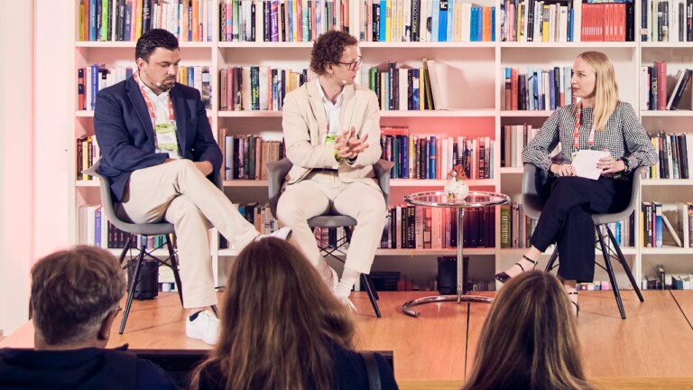 Magnus Baringer (321 Med) and Leonard Rinser (Venture Institute) in conversation with Johanna Kuroczik (Frankfurter Allgemeine Zeitung) at the DLD Health x BAIOSPHERE conference in Munich, Literaturhaus, June 12, 2026. Photo: Dominik Gigler for DLD / Hubert Burda Media