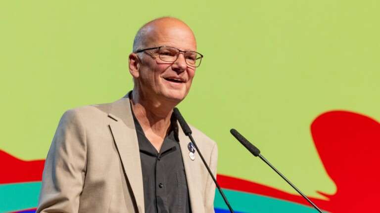 Michael Klimke, head of the Bavarian AI Agency BAIOSPHERE, speaks at the DLD Future Hub conference in Munich.