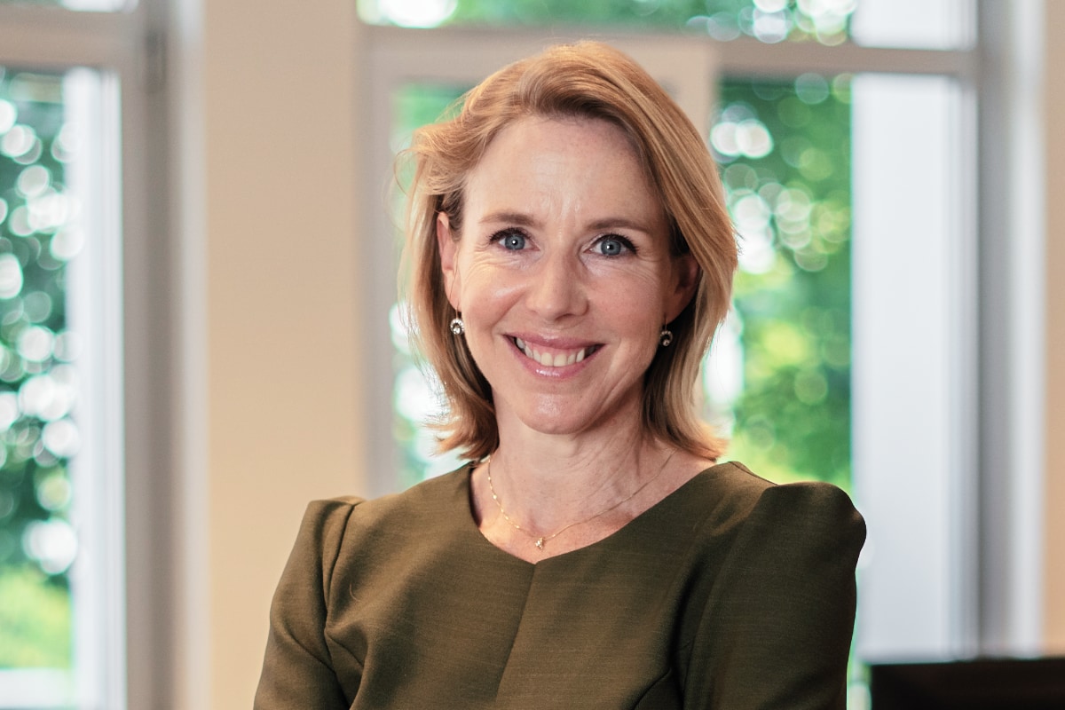 Environmental portrait of Stientje van Veldhoven, WRI, in an office setting.